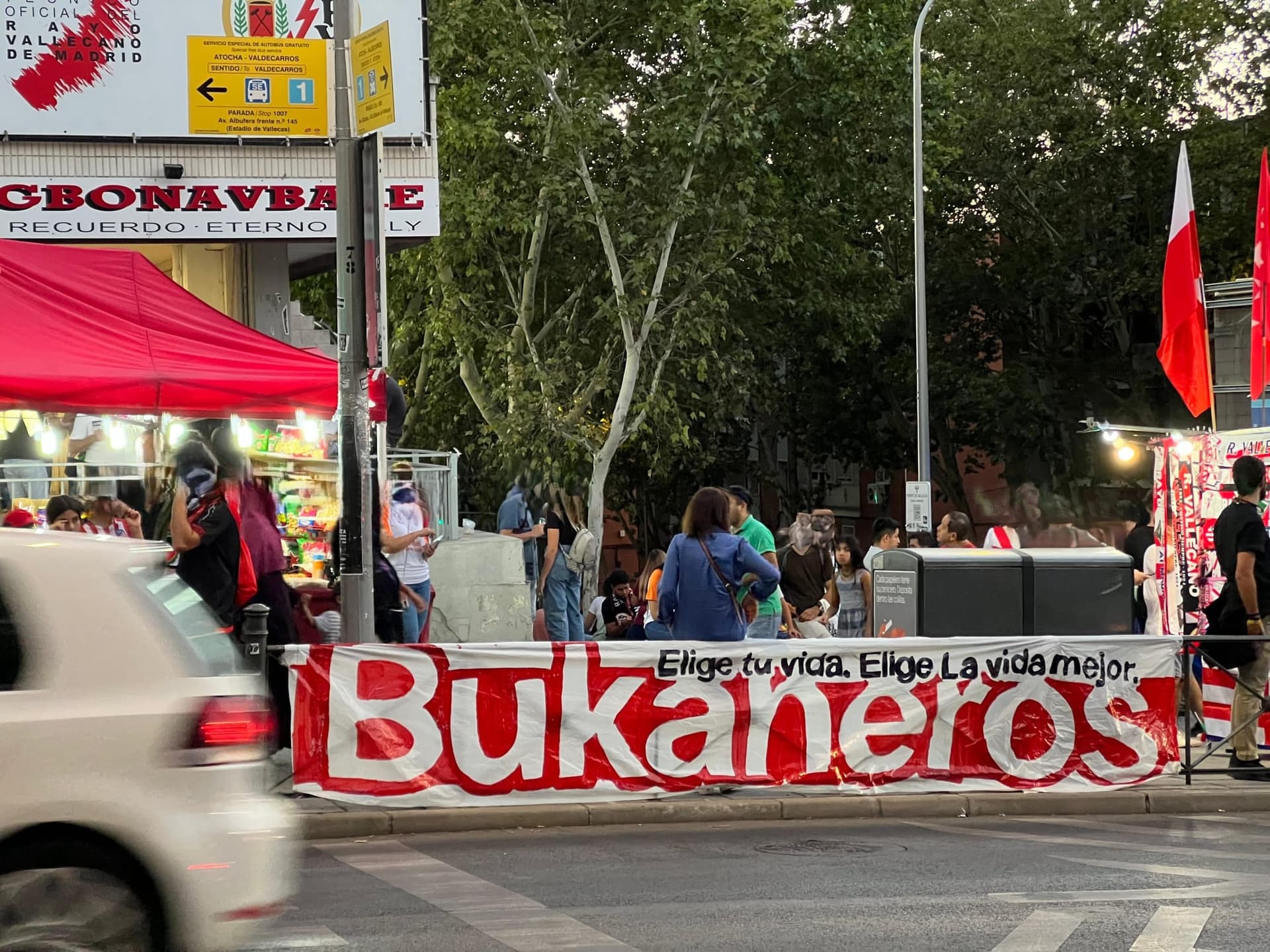 A Bukaneros banner reading “Elige tu vida, elige la vida mejor” outside the Mercado de Numancia before kickoff